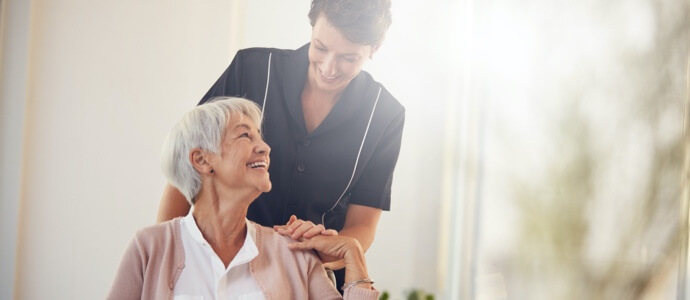 Senior woman with aide