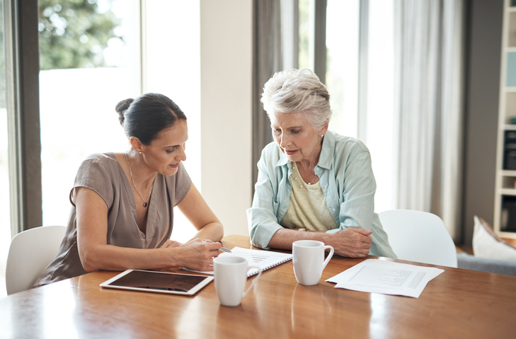 Mother and daughter discussing estate planning