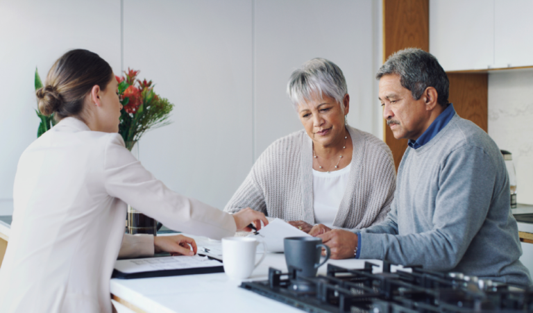 Older couple working with estate planning attorney
